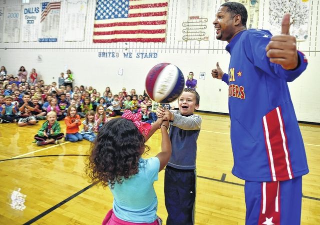 Former Harlem Globetrotter brings 'Stand Tall Against Bullying' campaign to  Martinsville students