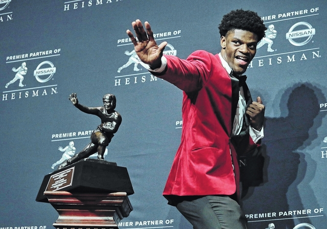 Louisville S Lamar Jackson Wins Heisman Trophy Times Leader