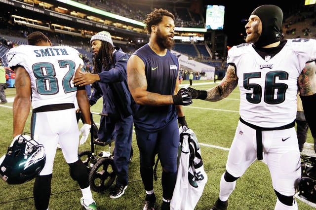 Philadelphia Eagles defensive end Chris Long (56) rushes in