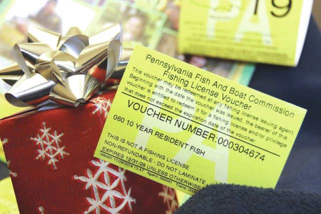 a: Paper voucher from a local lottery shop, containing 12 tips