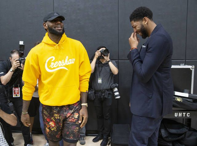 Lebron wearing custom Lakers Crenshaw jerseys . Don't think these