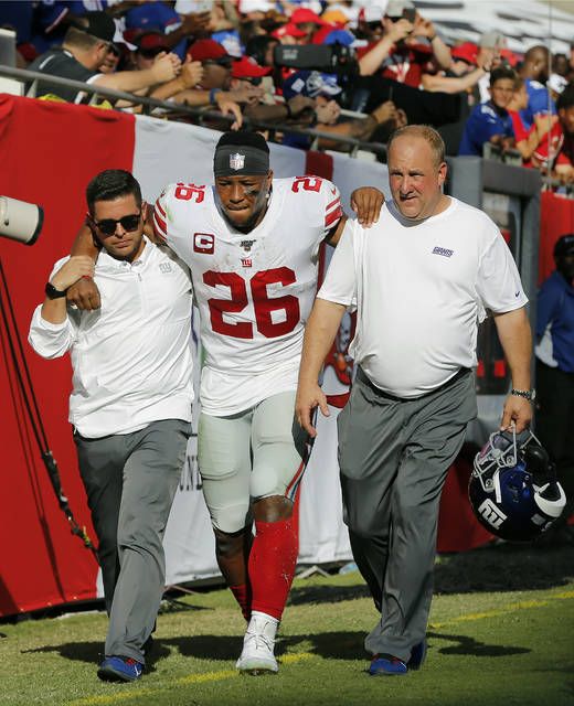 Barkley injures right ankle in NYG win over ARI