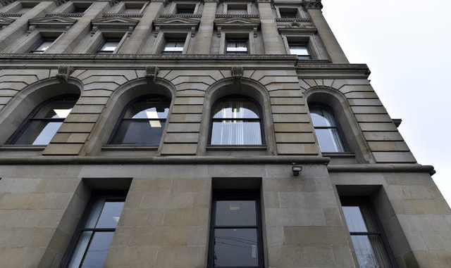  Officials say the appearance of the historic Luzerne County Courthouse should not change with the upcoming installation of more than 500 new windows for energy efficiency. A new sample window has been installed at the center of this bottom row of windows on the Susquehanna River side of the structure. File photo 