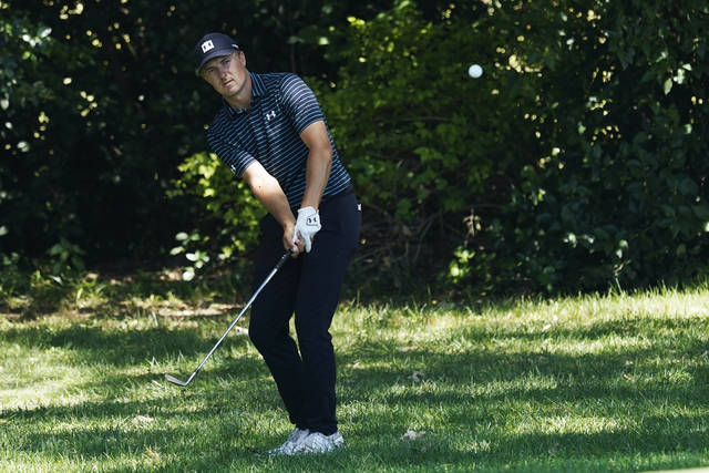 <p>Jordan Spieth hits out of the rough off the eighth fairway at Colonial during Friday’s second round.</p> <p>David J. Phillip | AP photo</p>