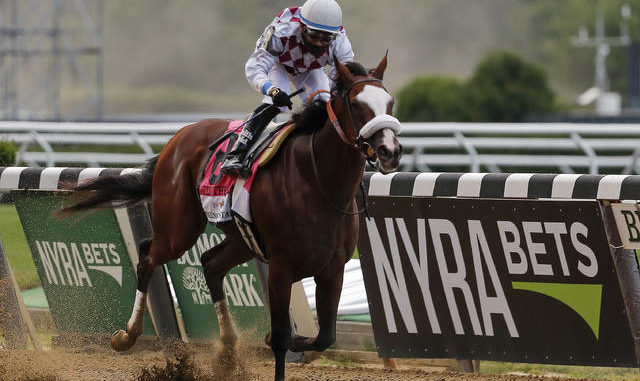  Tiz the Law (8), with jockey Manny Franco up, crosses the finish line to win the152nd running of the Belmont Stakes horse race, Saturday, June 20, 2020, in Elmont, N.Y. (AP Photo/Seth Wenig) 