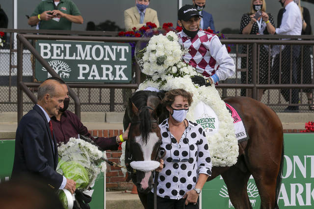 <p>Tiz the Law (8), with jockey Manny Franco up, poses for a photo with assistant trainer Robin Smullen after winning the 152nd running of the Belmont Stakes on Saturday in Elmont, N.Y.</p> <p>AP photo</p>