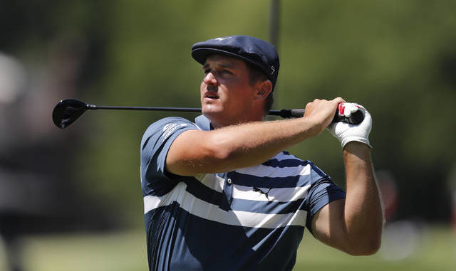  Bryson DeChambeau drives on the second tee during the final round of the Rocket Mortgage Classic on Sunday at Detroit Golf Club in Detroit. AP photo 