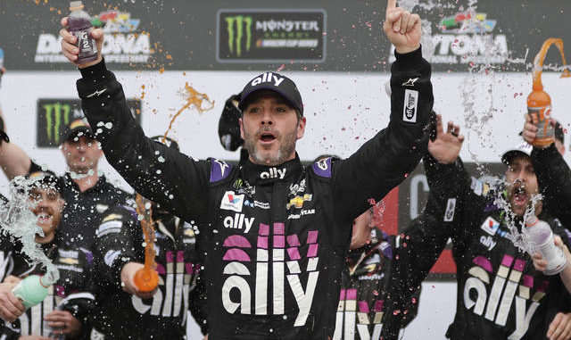  After missing the first Cup race of his career because of a positive COVID-19 test, Jimmie Johnson has since twice tested negative and has been cleared to race Sunday. John Raoux | AP file photo 