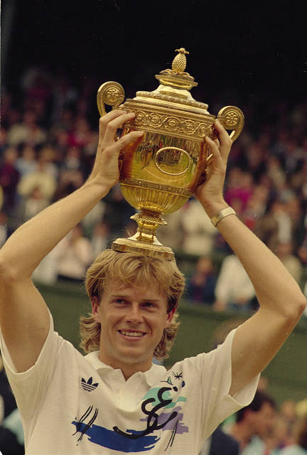<p>Stefan Edberg of Sweden holds his trophy on his head at Wimbledon after winning the men’s singles championship for the first time on July 5, 1988. Edberg defeated Boris Becker.</p> <p>AP file photos</p>