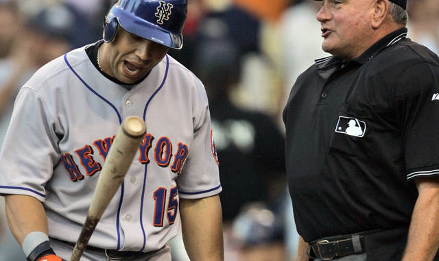  In this July 18, 2007, file photo, New York Mets outfielder Carlos Beltran, left, disagrees with umpire Rick Reed after being called out on strikes in the first inning of the baseball game against the San Diego Padres in San Diego. Reed, whose career as a big league umpire spanned three decades and included two All-Star games and a World Series, has died. He was 70. AP photo 