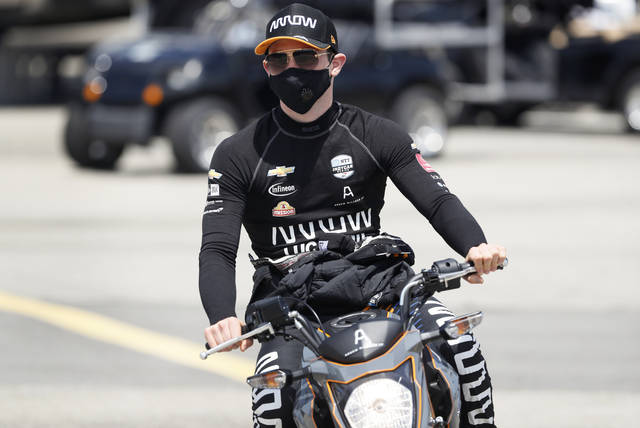 <p>Pato O’Ward, of Mexico, makes his way to his car during practice for an IndyCar Series race at Iowa Speedway in Newton, Iowa.</p> <p>AP photo</p>