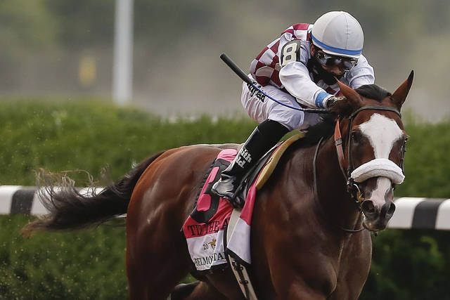 
			
				                                Tiz the Law (8), with jockey Manny Franco up, approaches the finish line on his way to win the152nd running of the Belmont Stakes horse race on June 20, 2020, in Elmont, N.Y.
                                 AP file photo

			
		