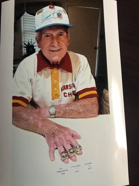
			
				                                George Toma, a native of Edwardsville, has been in charge of field preparations for all 54 Super Bowls. He is seen wearing the three rings presented to him by the Kansas City Chiefs — the 1966 Chiefs championship ring, the Super Bowl IV ring, and the Super Bowl LIV ring.
 
			
		