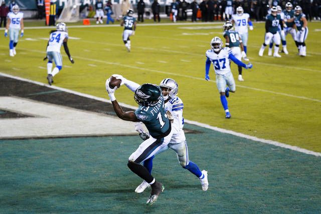 Eagles beat Cowboys 23-9 in sloppy battle for first place