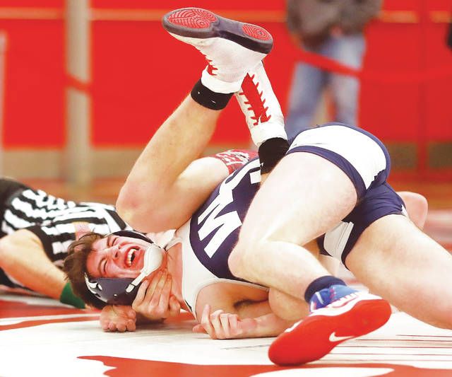   			  				                                The coronavirus pandemic will alter the postseason wrestling scene after districts this season.                                   Times Leader file photo    			  		