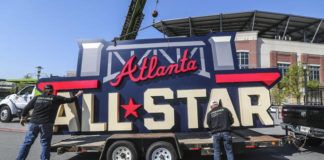 
			
				                                Workers load an All-Star sign onto a trailer after it was removed from Truist Park in Atlanta on Tuesday. MLB has moved this summer’s All-Star Game from Atlanta to Denver in response to recent voting laws passed in Georgia.
                                 John Spink | AP photo, Atlanta Journal-Constitution

			
		