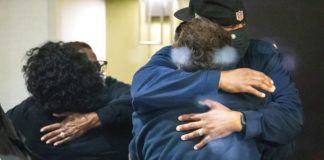 
			
				                                People hug after learning that their loved one is safe after a shooting inside a FedEx building Friday, April 16, 2021. Multiple people were shot and killed in a late-night shooting at a FedEx facility in Indianapolis, and the shooter killed himself, police said.(The Indianapolis Star via AP)
 
			
		