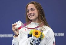 
			
				                                Emma Weyant, of United States, poses with her silver medal on the podium for the women’s 400-meter individual medley at the 2020 Summer Olympics on Sunday in Tokyo, Japan.
                                 AP photo

			
		