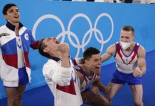 
			
				                                Russian Olympic Committee’s artistic gymnastics men’s team, from right, Denis Abliazin, right, Nikita Nagornyy, David Belyavskiy and Artur Dalaloyan celebrate after winning the gold medal at the 2020 Summer Olympics on Monday in Tokyo.
                                 AP photo

			
		