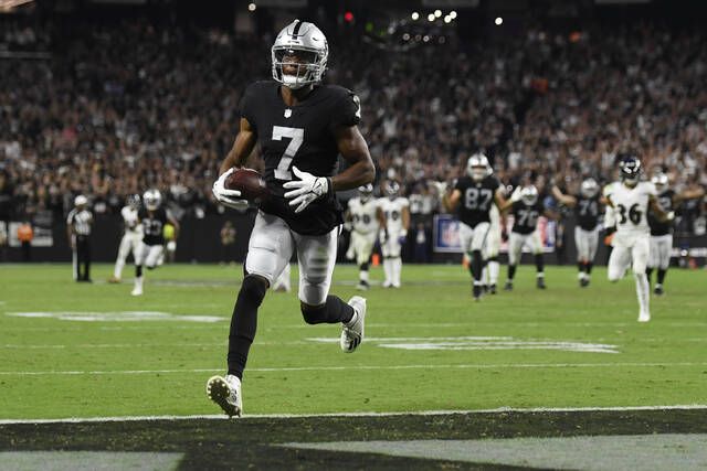 Carr's TD pass caps Raiders rally past Ravens 33-27 in OT - WTOP News