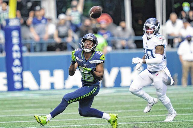 Tyler Lockett catches passes in walk-through, might play Sunday against  Jets