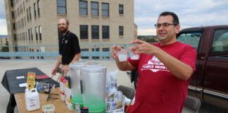 
			
				                                Richard Miller, executive director of the Osterhout Free Library, prepares martinis for visitors at the Brewsterhout Annual Rooftop Party.
                                 Patrick Kernan | Times Leader

			
		