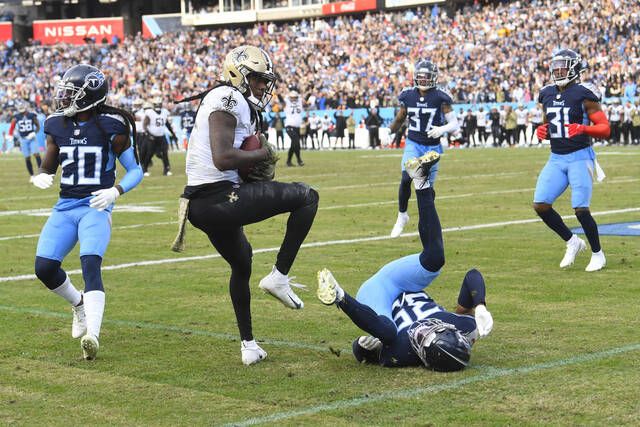 Titans' NFL-best winning streak now 6, edge Saints 23-21