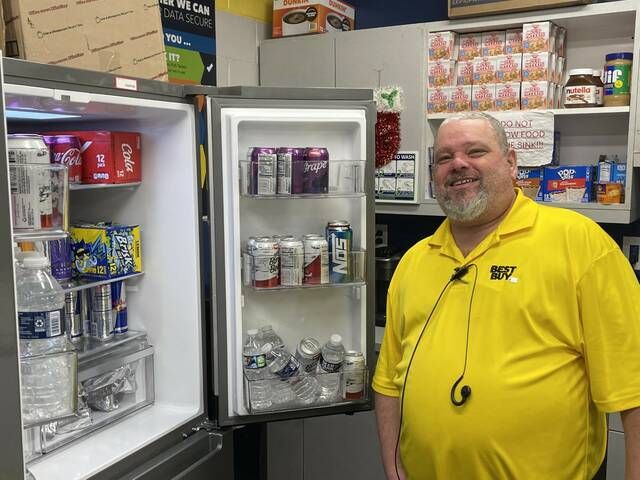 Chuck Sullick, general manager at Best Buy in the Arena Hub Plaza, made sure the refrigerator and snack shelves in the employee break room were fully stocked so his employees had everything they would need to get through a busy Black Friday. Sullick, of Mountain Top, also ordered food from Cracker Barrel for the staff. Best Buy opened at 5 a.m. Friday and the store was filled with customers all day.
                                 Bill O’Boyle | Times Leader