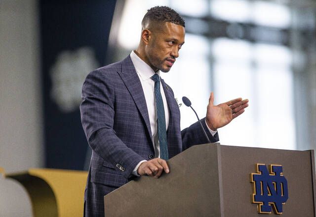 
			
				                                Marcus Freeman answers questions during a news conference Monday at the Irish Athletic Center in South Bend, Ind. Notre Dame formally introduced Freeman as its new football coach on Monday.
                                 AP photo

			
		