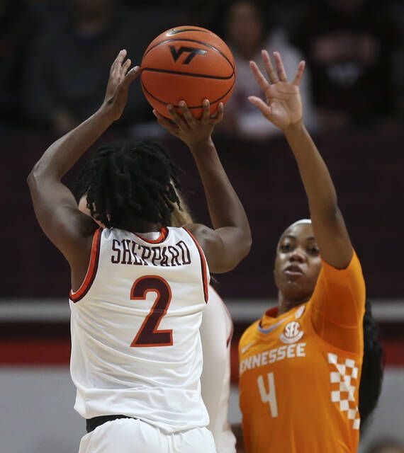 <p>Virginia Tech’s Aisha Sheppard (2) shoots a 3-point basket over Jordan Walker (4) of Tennessee in the first half of an NCAA college women’s basketball game in Blacksburg Va., Sunday, Dec. 5, 2021. (Matt Gentry/The Roanoke Times via AP)</p>