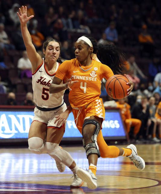 
			
				                                Jordan Walker (4) of Tennessee drives while defended by Virginia Tech’s Georgia Amoore (5) in the first half of an NCAA college women’s basketball game in Blacksburg Va., Sunday, Dec. 5, 2021. (Matt Gentry/The Roanoke Times via AP)
 
			
		