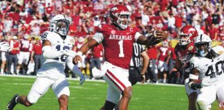 
			
				                                Arkansas quarterback KJ Jefferson (1) scores on an 8-yard touchdown run against Penn State during the second half of the Outback Bowl on Saturday in Tampa, Fla.
                                 AP photo

			
		