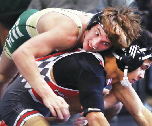 
			
				                                Reigning state champion Jaden Pepe of Wyoming Area (top), works on Hazleton Area’s Jorven Rodriguez in the 126-pound semifinals of Saturday’s WVC Tournament. Pepe won by decision and then added a pin in the finals to help the Warriors edge the Cougars for the team title.
                                 Fred Adams | For Times Leader

			
		