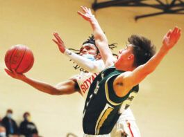 
			
				                                Holy Redeemer guard Justice Shoats goes to the basket as Wyoming Area forward Dane Schutter defends Wednesday night.
                                 Fred Adams | For Times Leader 1-19-21

			
		
