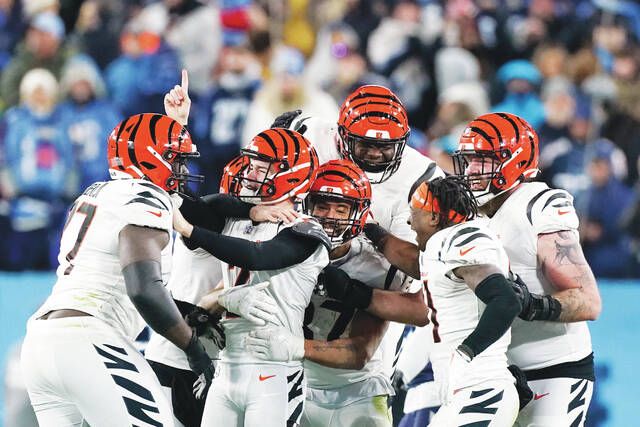 Bengals win first playoff game in 31 years, set the table for a