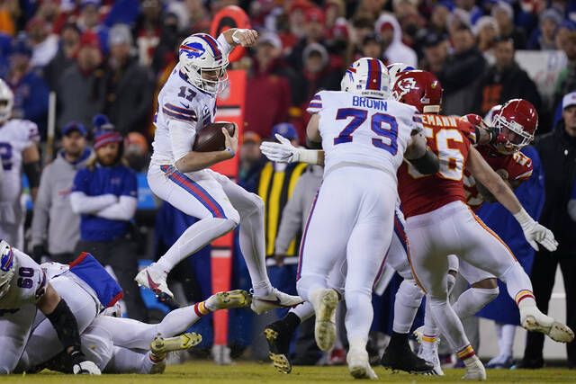 Chiefs rally past Bills, 42-36, in overtime in wild playoff game