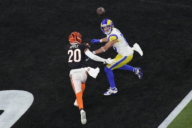 Super Bowl 2022: Rams' Cooper Kupp at mountain top after winning