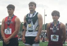 
			
				                                Wyoming Area’s Drew Mruk, center, stands atop the podium after winning the gold medal in the Class 2A javelin event at the PIAA Track and Field Championships on Friday in Shippensburg.
                                 Tom Robinson | For Times Leader

			
		
