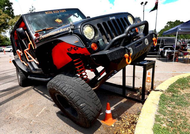 Mike Badyrka, 48, of Harveys Lake, rides his Jeep up the flex ramp during the Fury Fest 2022 held at Kirby Park.
                                 Fred Adams | For Times Leader
