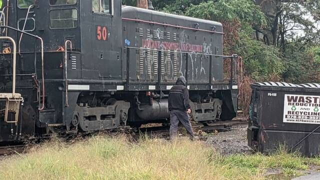 <p>Police are seen searching railroad tracks along South Pennsylvania Avenue, Wilkes-Barre, where a suspect involved in a burglary at the Wyoming Valley Mall was seen.</p>
                                 <p>Ed Lewis | Times Leader</p>
