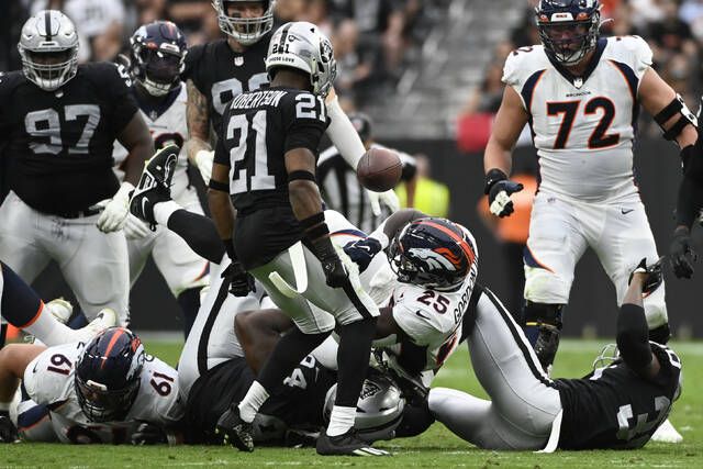 Jacobs, defense lead Raiders to 1st win, 32-23 over Broncos