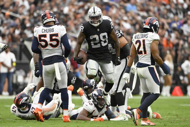 Jacobs, defense lead Raiders to 1st win, 32-23 over Broncos - The