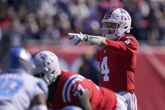 FOXBOROUGH, MA - OCTOBER 09: New England Patriots running back Rhamondre  Stevenson (38) runs with the ball during a NFL game between Detroit Lions  and New England Patriots on October 9, 2022