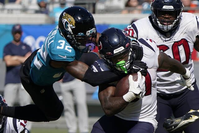 Jaguars linebacker Travon Walker has high ankle injury