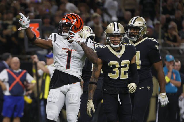 Burrow-Chase connection leads Bengals past Saints 30-26