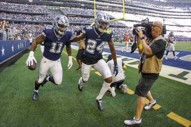 Cowboys' Prescott, Parsons rumble to 49-29 win over Bears