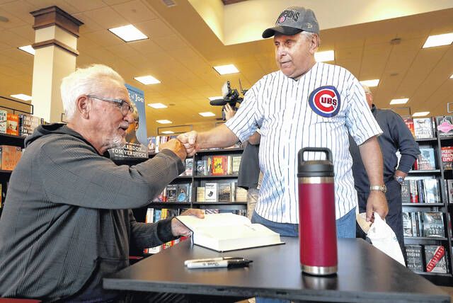 Crowd turns out for Joe Maddon book signing