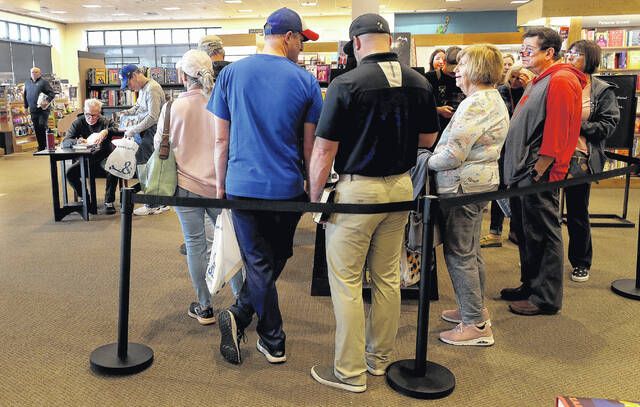 Crowd turns out for Joe Maddon book signing