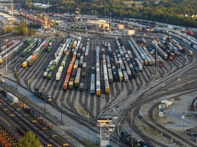 Freight train cars sit in a Norfolk Southern rail yard on Sept. 14 in Atlanta. The Senate on Thursday passed a bill to bind rail companies and workers to a proposed settlement that was reached between the rail companies and union leaders in September.
                                 AP file photo