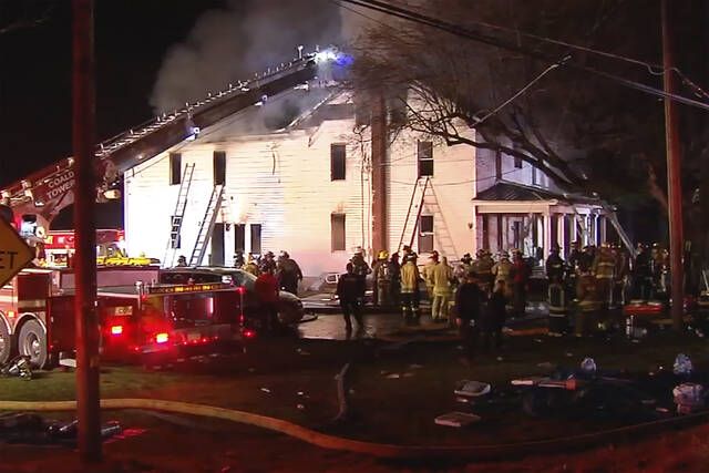 
			
				                                Firefighters work on the scene of a house fire Wednesday in West Penn Township, Schuylkill County. Pennsylvania State Police say two firefighters died responding to the blaze where a body was found, while two people who lived in the home got out safely.
                                 WFMZ-TV via AP

			
		